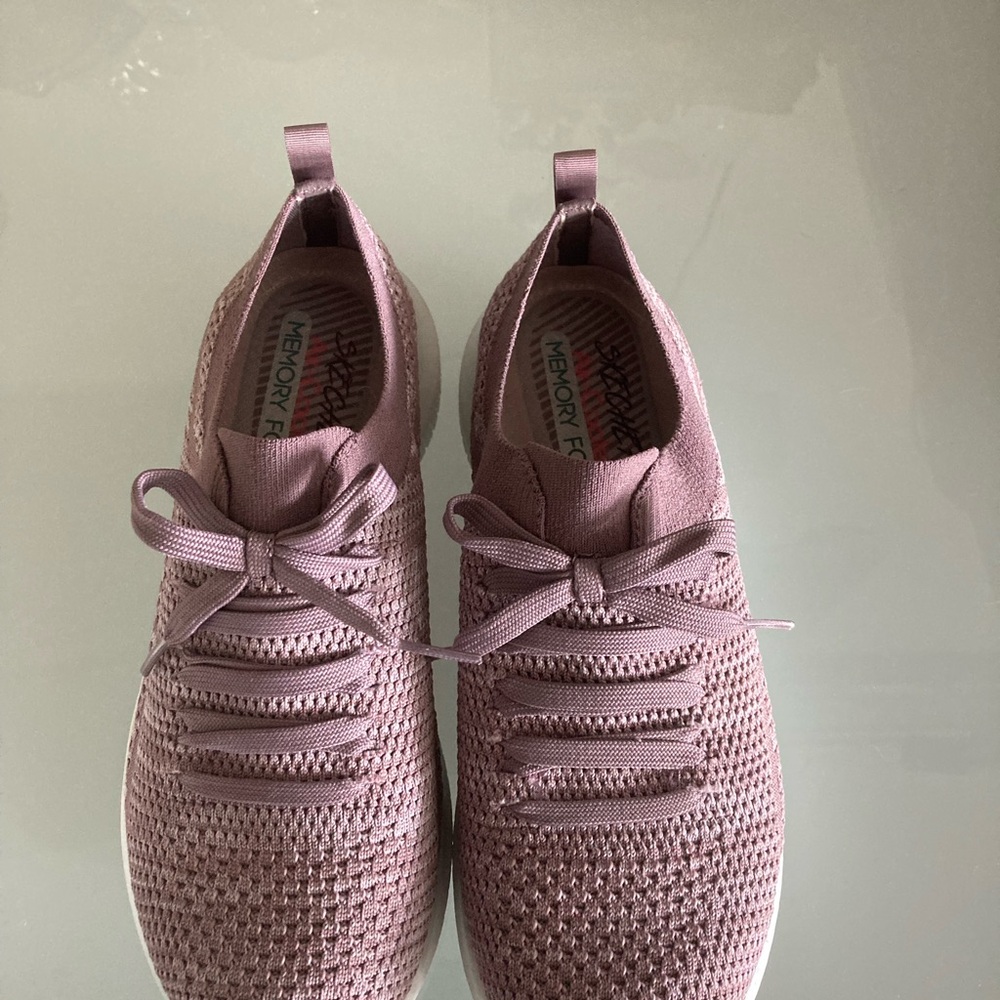 White and purple walking shoes